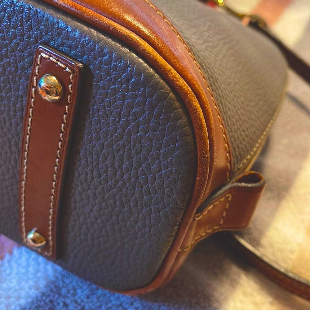 Dooney and bourke , very well treated bag.